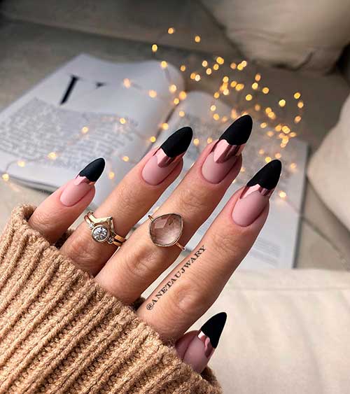 Long almond matte black tip nails with rose gold chrome abstract nail art design - Black Nail Designs 2022 Long almond matte black tip nails with rose gold chrome abstract nail art design - Black Nail Designs 2022