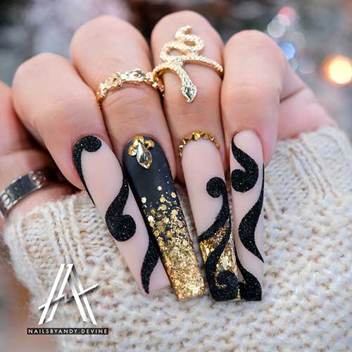 Long coffin matte New Year’s Eve black nails with gold glitter and abstract nail art - Black Nail Designs