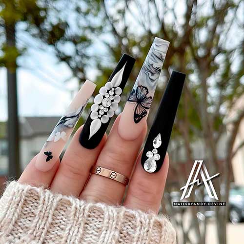 Long coffin matte black nails with marble effects, butterflies, and rhinestones - Black Nail Designs 2022