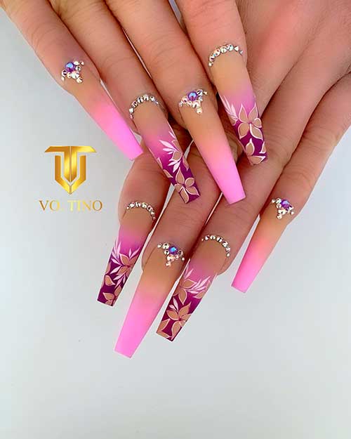 Long coffin matte purple and pink spring ombre nails with floral nail art and rhinestones