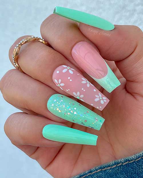 Long coffin mint green spring nails with glitter, French tip, and floral accents