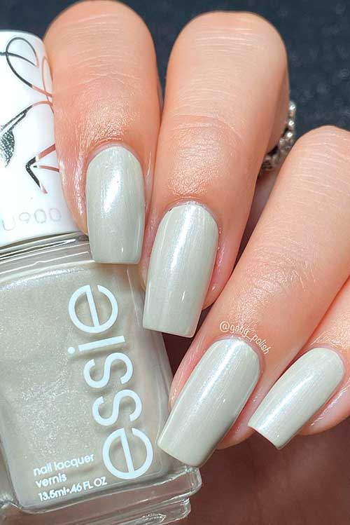 Long square shimmer white grey nails that using Essie nail polish quill you be mine from valentines day collection 2022