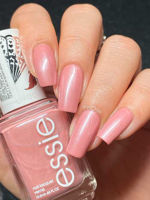Long square soft pink nails that using Essie nail polish Pretty In Pink from valentine's day collection 2022