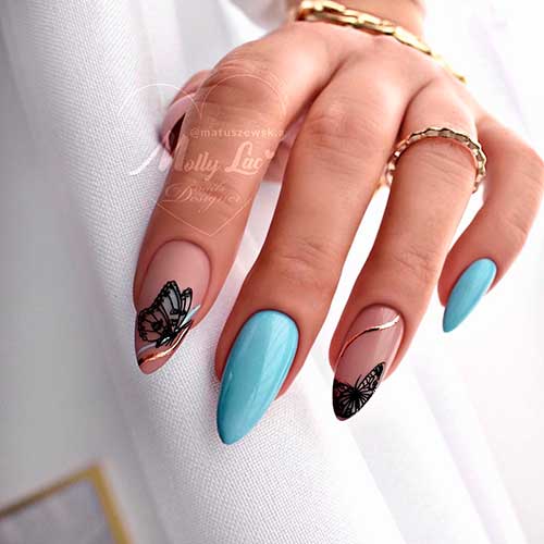 Medium almond nude base color butterfly spring nails with two accent light blue nails Medium almond nude base color butterfly spring nails with two accent light blue nails