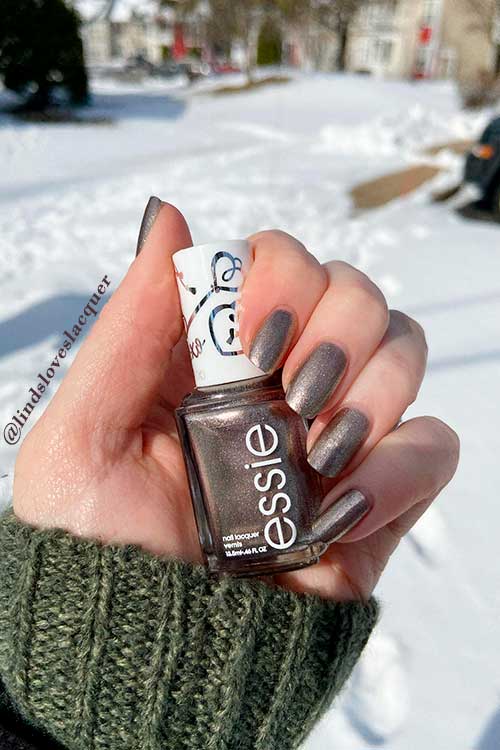 Square shimmering silver nails that using Essie Nail Polish Under Locket & Key from valentine's day collection 2022