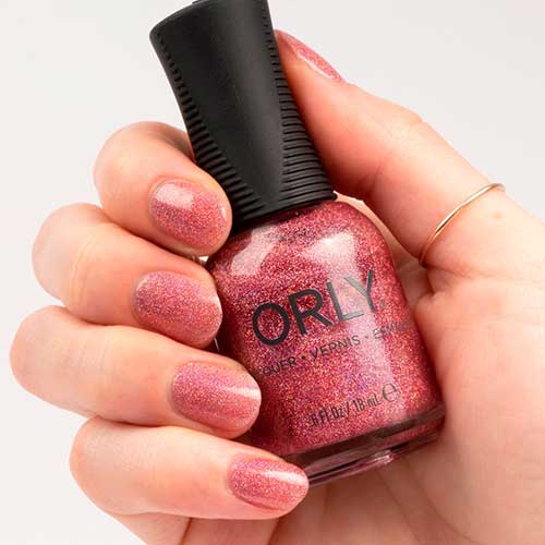 Short pink holographic glitter nails using XOXO ORLY Nail Polish