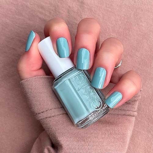 Short pastel blue nails that uses Essie Nail Polish Flight of Fantasy for spring season