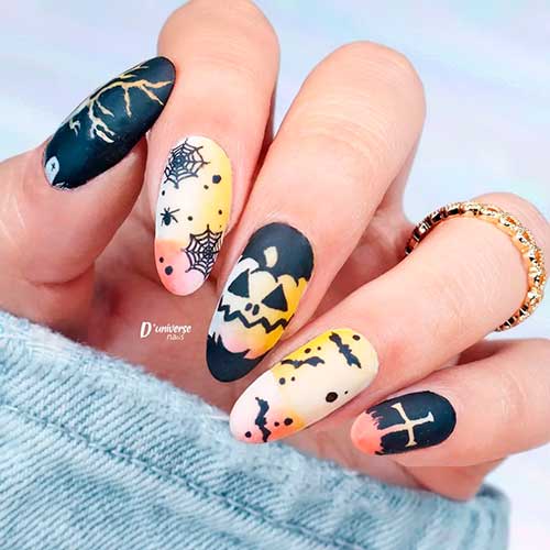 Different Halloween-Themed Nails Design Different Matte Halloween-Themed Nails Design Consists of Pumpkins, Bats, Spider web, and Goth Nail Art