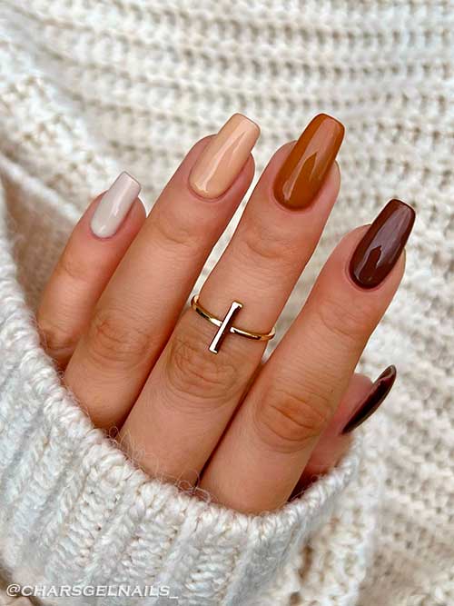 Glossy almond, latte, caramel, brunette, and cocoa nails