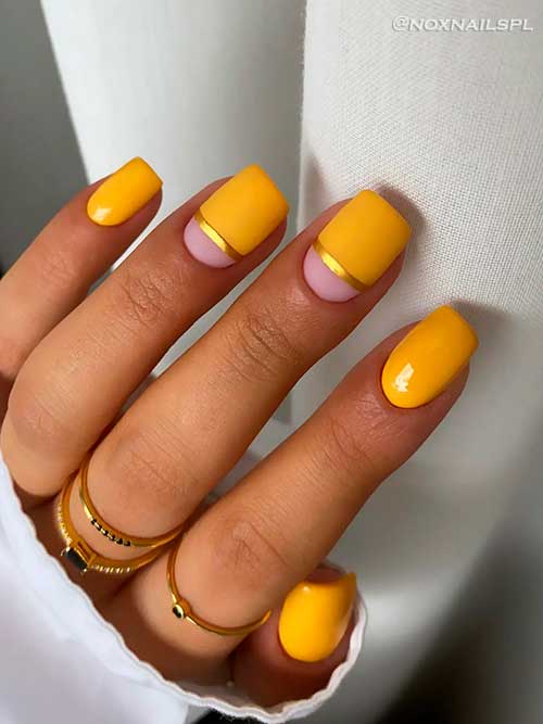 Short square shaped glossy and matte mustard nails with gold stripe decorations