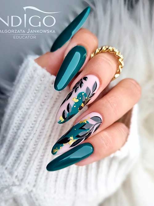 Long almond-shaped nails with leaf nail art on two accent pink nails with gold foil flakes