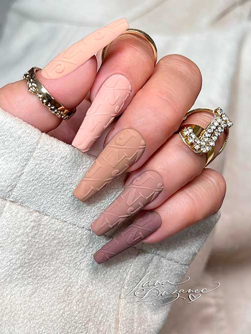 Matte coffin different shades of brown and nude nails Long matte coffin different shades of brown and nude nails
