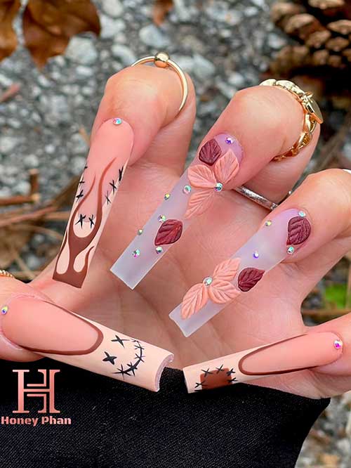 Matte long coffin shaped spooky nude French tip nails with maple leaves for Fall 2022