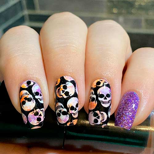 Black Skull Nails with Purple Glitter for Halloween 2022