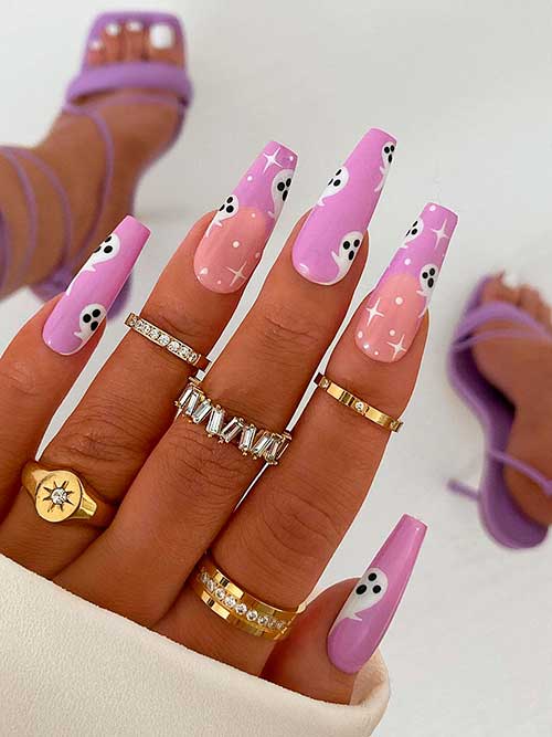 Chic Halloween Ghost Nails Chic Halloween Ghost Nails consists of purple coffin nails with white little ghosts and celestial nail art