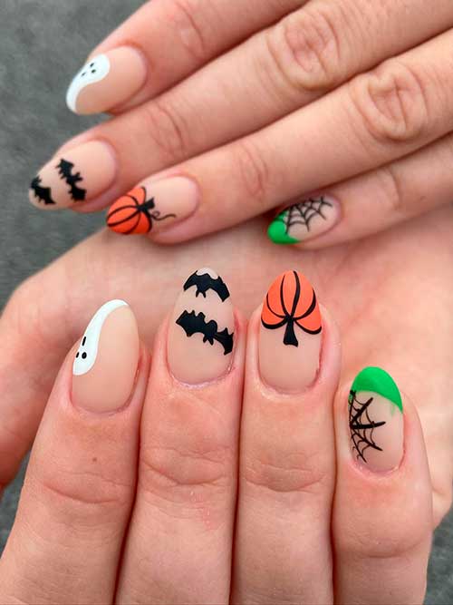 Cute Halloween Themed Nail Design with Nude Base Color