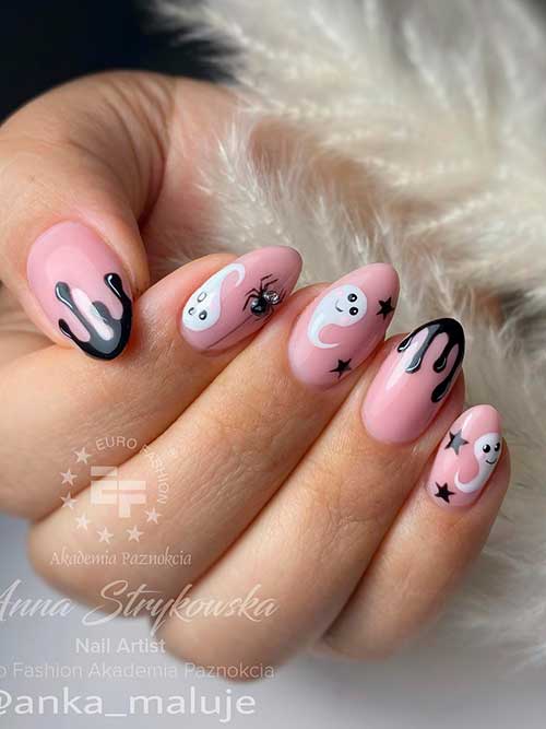 Easy Ghost Nails consists of nude nails with white ghosts, spider, stars, and blood drip nail art