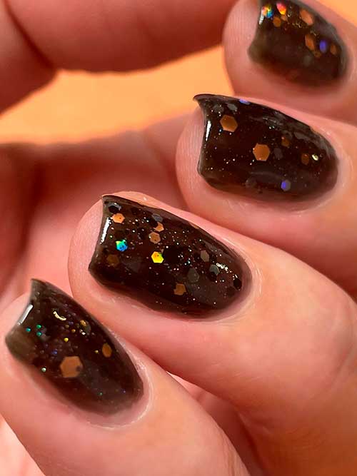 Spellbound Confetti Topper Short Black Nails with Confetti Glitter Using Orly Spellbound and Smoke Jelly from Orly x Kelli Marissa collection