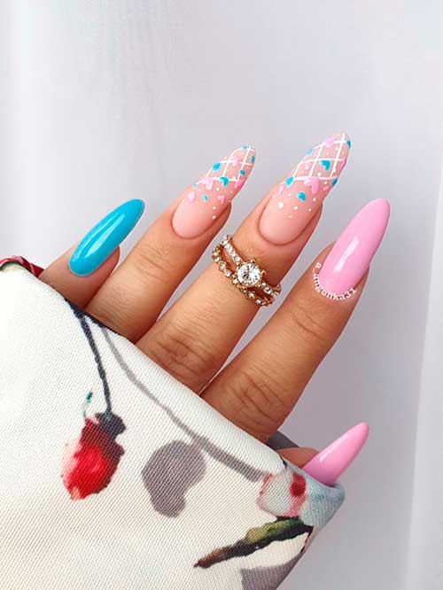 Long almond pastel blue and pink valentine’s day nails with tiny hearts on two nude accent nails