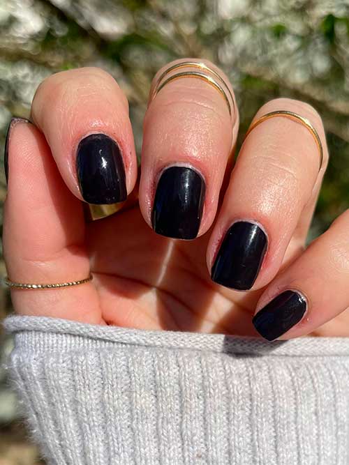 Essie home by 8 Short soft black nails using Essie nail polish home by 8 from the unguilty pleasures collection