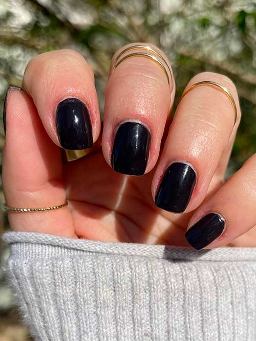 Short soft black nails using Essie nail polish home by 8 from the unguilty pleasures collection