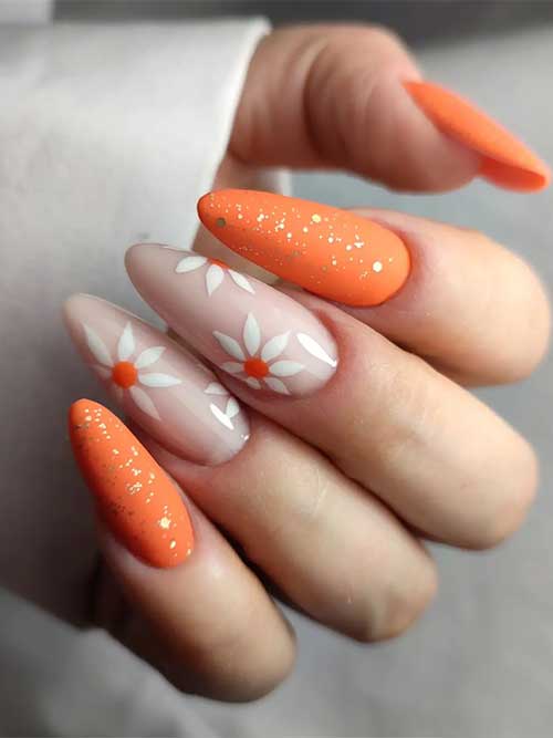 Orange Spring Nails with Daisy Flowers Pastel Matte Long Almond Shaped Orange Spring Nails with gold glitter and Daisy Flowers on Two Accent Nails