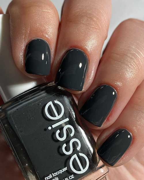 Short muted chalky black nails using Essie Climbing High from Essie Summer 2023 Collection