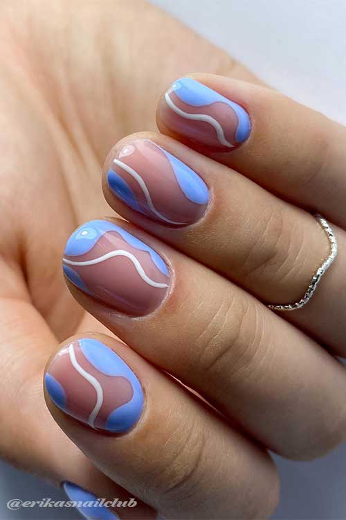 Short light blue and white swirl nails