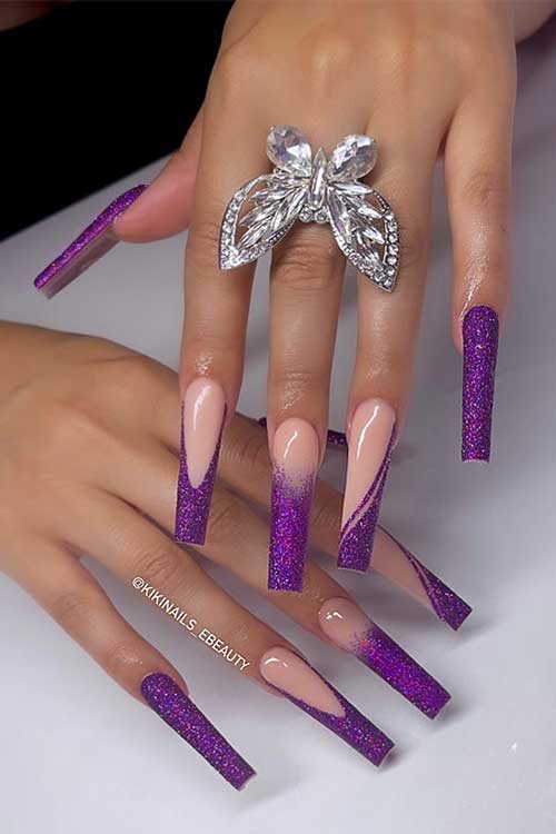 Long glittery purple nails with French accents. Long glittery purple nails with French accents.