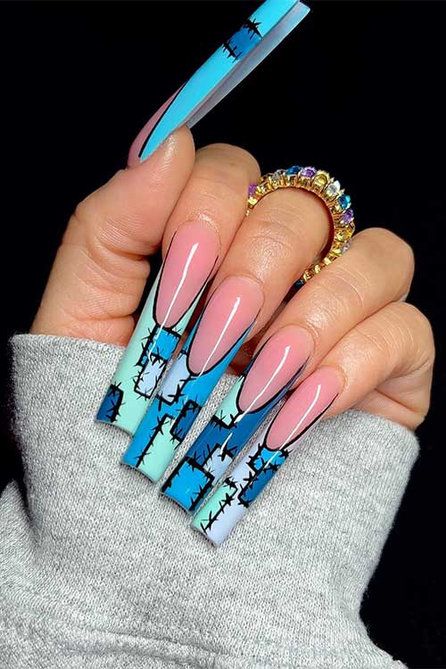 Long pastel green, blue, and sky blue French nails with patch and stitch nail art is one of the best Halloween nail art ideas