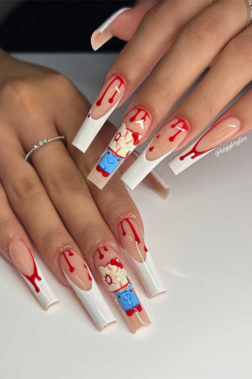 Long white French nails with blood drip nail art and a creepy kitty on an accent nail