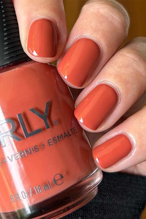Short dusty brick red nails with Orly In The Conservatory from Orly Plot Twist Collection 2023
