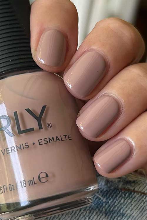 Short nude nails with a mauve creme shade with Orly Shaky Alibi from Orly Plot Twist Collection 2023