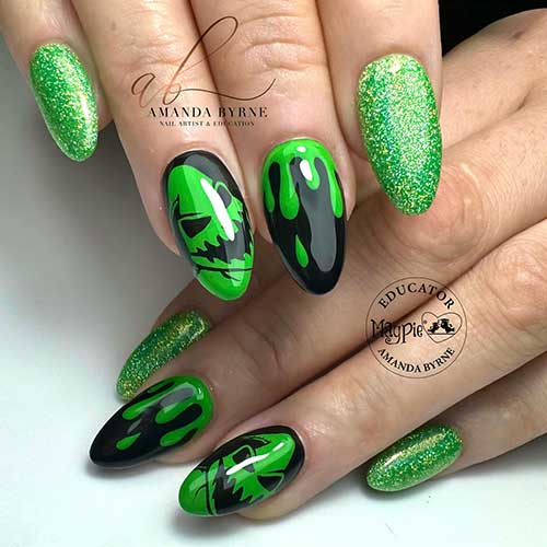 Sparkling green and black oogie boogie man nails that adorned with green glitter on two accent nails.