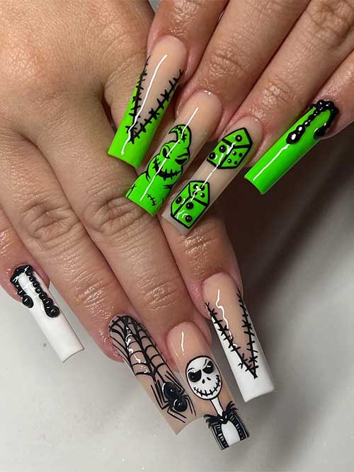 two hands different colors Halloween nail design that features a skeleton and Oogie boogie man nails