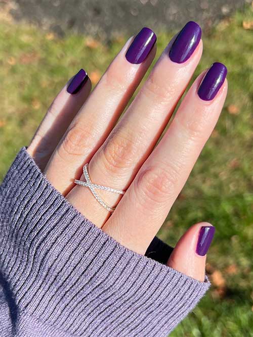 Essie Underground Ball It’s a dark plum purple vegan nail polish with red undertones from the Essie Fall 2023 collection