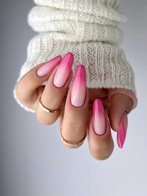 Stunning long almond-shaped light to hot pink ombre nails with glitter pink negative space French tips Stunning long almond-shaped light to hot pink ombre nails with glitter pink negative space French tips