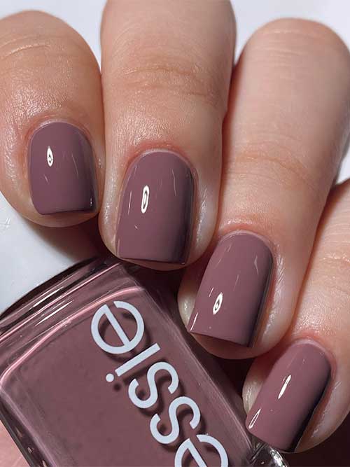 Short warm raisin taupe nails using Essie Mismatch to Match nail polish from Essie Odd Squad Collection