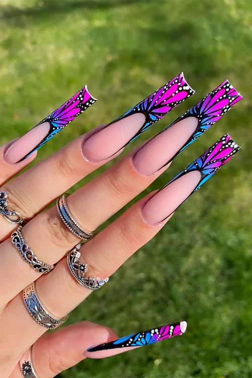 Gorgeous long square shaped hot pink and blue French tip nails with butterfly fairy wings art