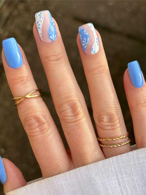 Bright sky-blue nails in solid or floral designs, perfect for a fresh summer look that shines in the sun. Bright sky-blue nails in solid or floral designs, perfect for a fresh summer look that shines in the sun.