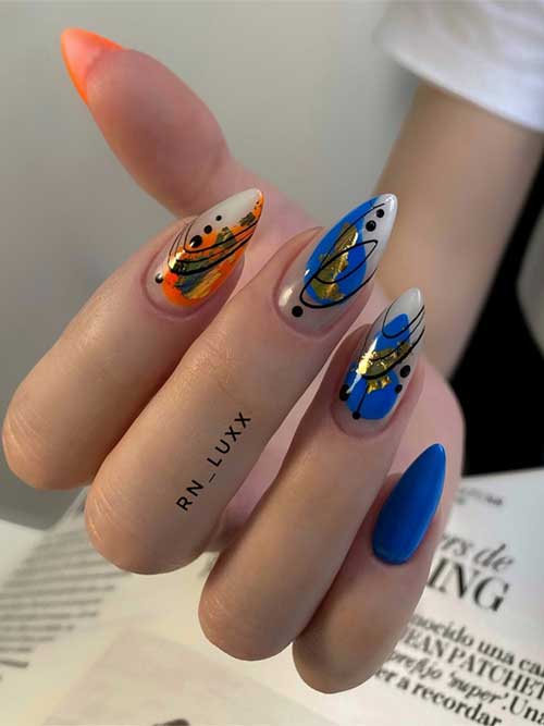 Mesmerizing blue nails adorned with orange and gold leaf, featuring abstract designs and black lines for a unique, artistic flair. Mesmerizing blue nails adorned with orange and gold leaf, featuring abstract designs and black lines for a unique, artistic flair.