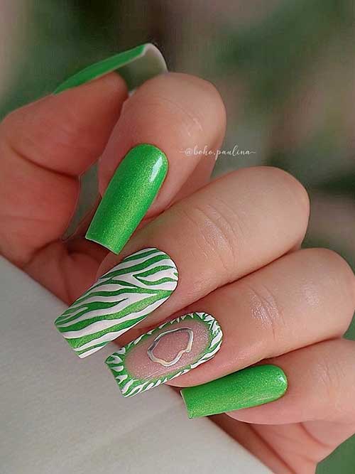 Cute green nails with zebra stripes and a heart outline, blending wild prints with romantic touches for a stylish look. Cute green nails with zebra stripes and a heart outline, blending wild prints with romantic touches for a stylish look.